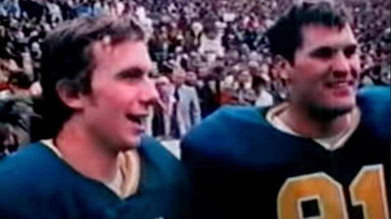 Joe Montana and teammate smiling