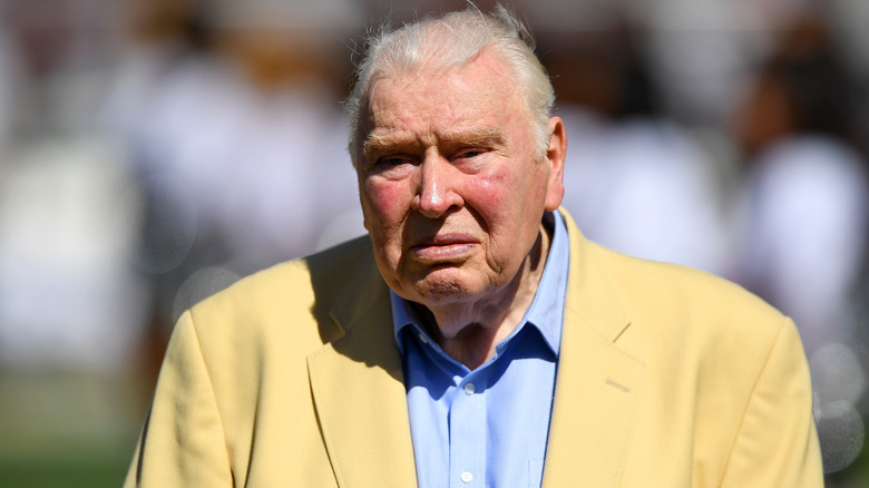 John Madden standing