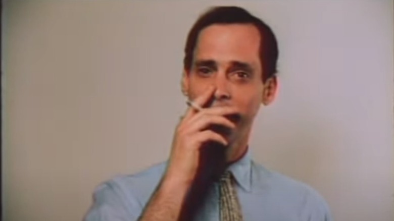 A young John Waters smoking