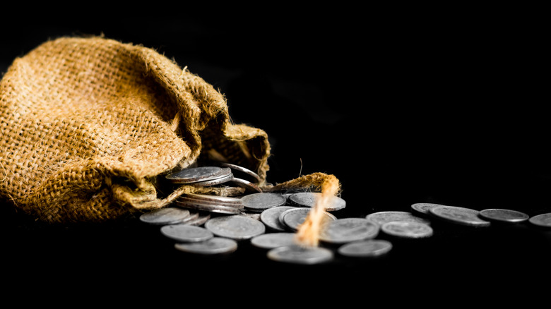 cloth sack with silver coins