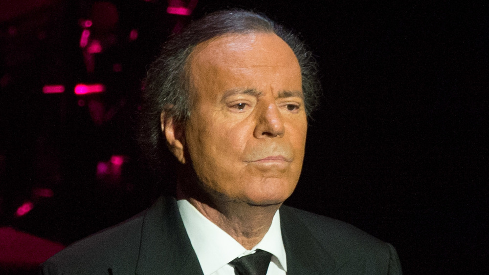 Julio Iglesias frowning 