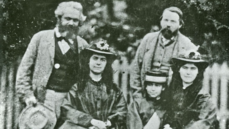 Karl Marx and some members of his family, plus Fredrich Engels 