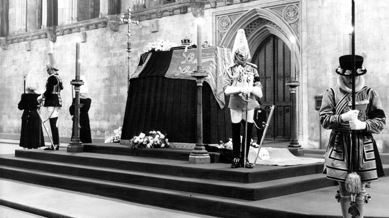 George VI's coffin is surrounded by guards
