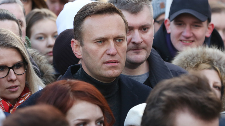 Alexei Navalny walks with protestors