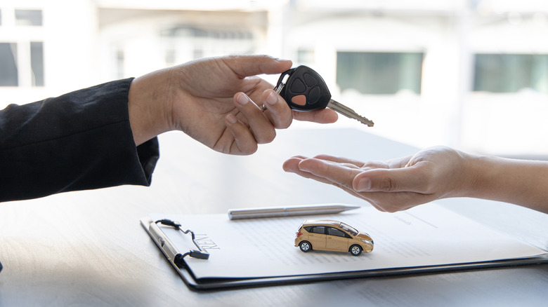 handing over car keys