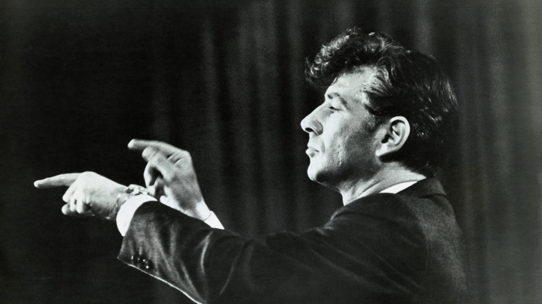Leonard Bernstein conducting pointing forward