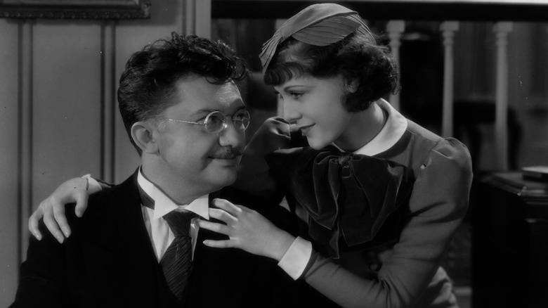 Jean Hersholt next to a woman