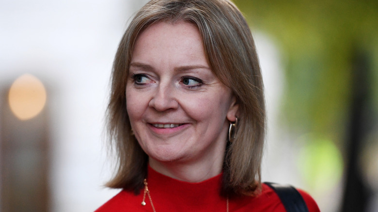 Liz Truss in red