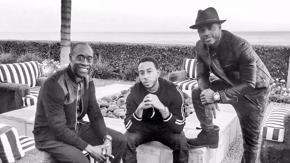 Don Cheadle, Ludacris, and Larenzt Tate posing outside 