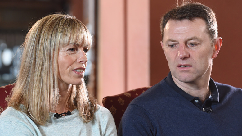 The McCanns look opposite directions