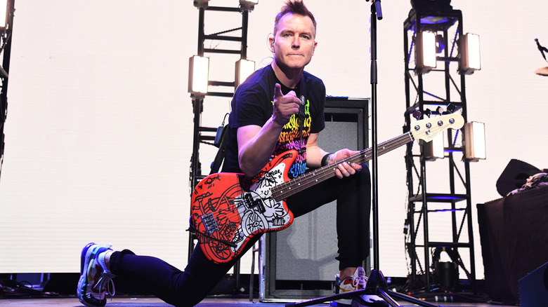 Mark Hoppus pointing at fans