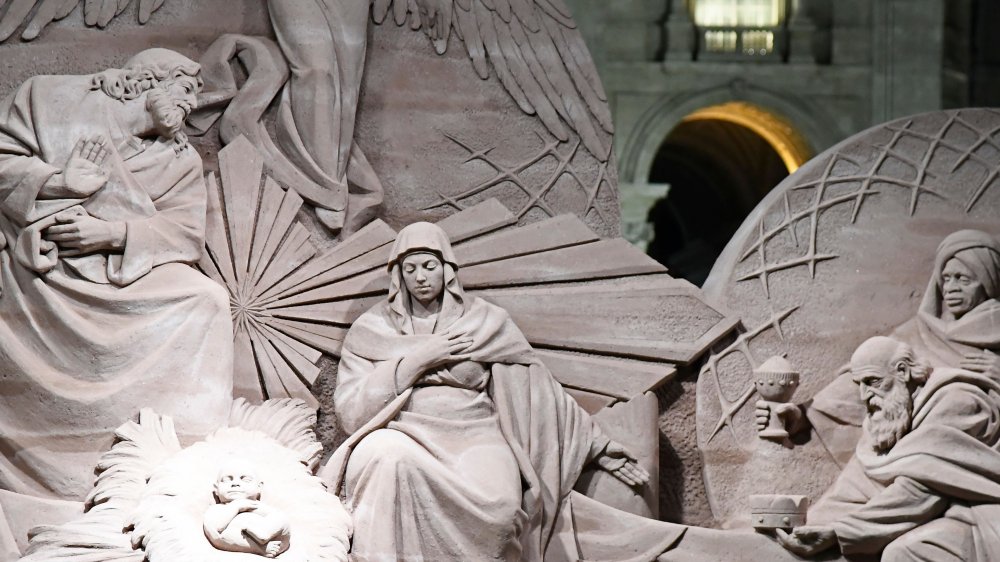 giant carved mural of the nativity in stone