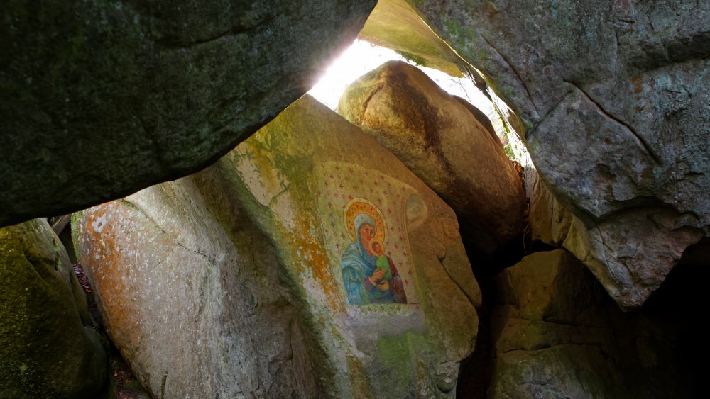 portrait of mary and Jesus on a flat stone