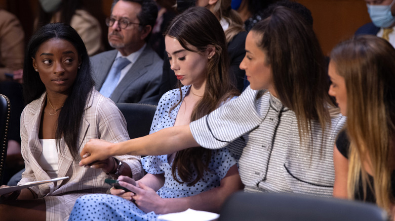 Gymnasts testify at a hearing