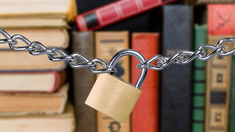 books behind padlock