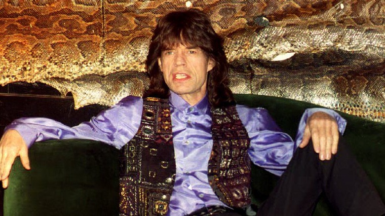 mick jagger sitting on courch