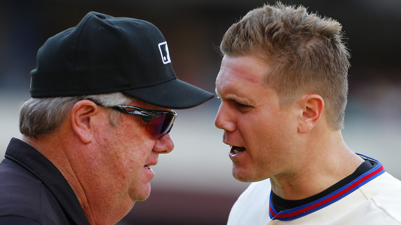 Joe West with player