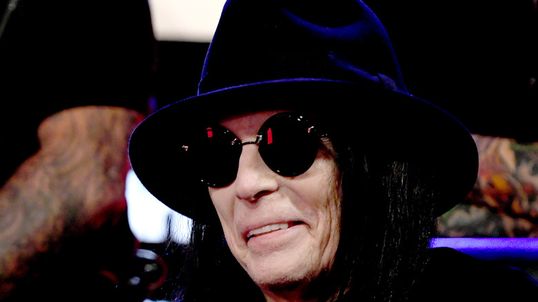 Mick Mars smiling