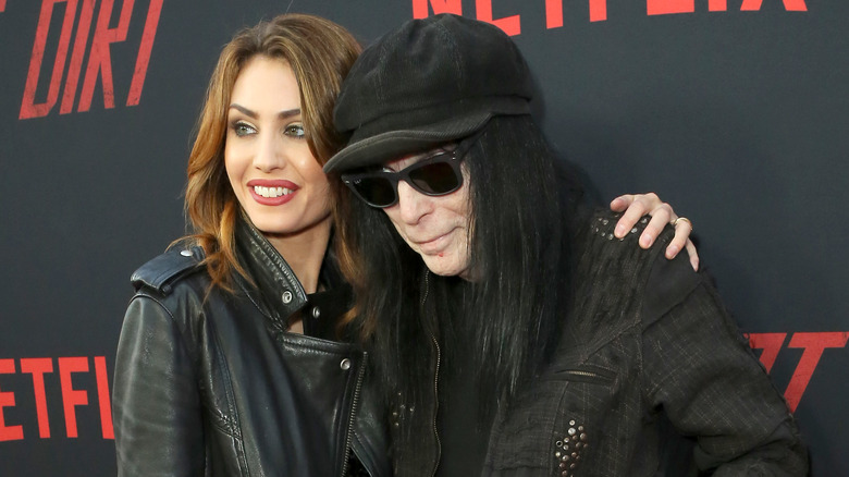 Mick Mars and his wife