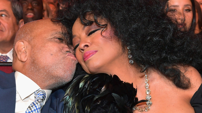 Berry Gordy kisses Diana Ross