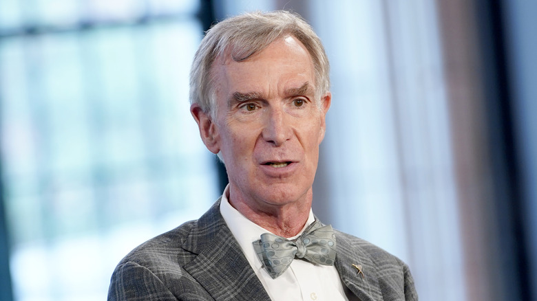 Bill Nye grey suit bowtie speaking