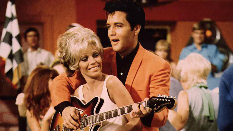 Nancy Sinatra and Elvis, performing