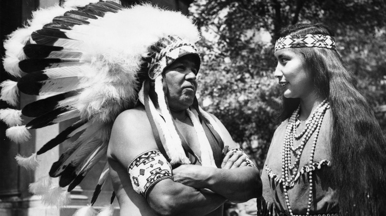 Native American man and woman talking