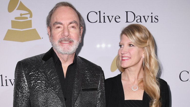 Neil Diamond and Katie McNeil smiling at event