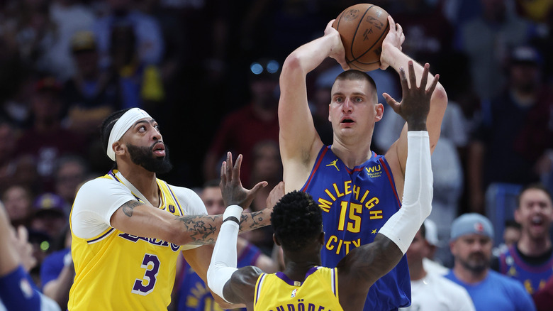 Nikola Jokić passing the basketball