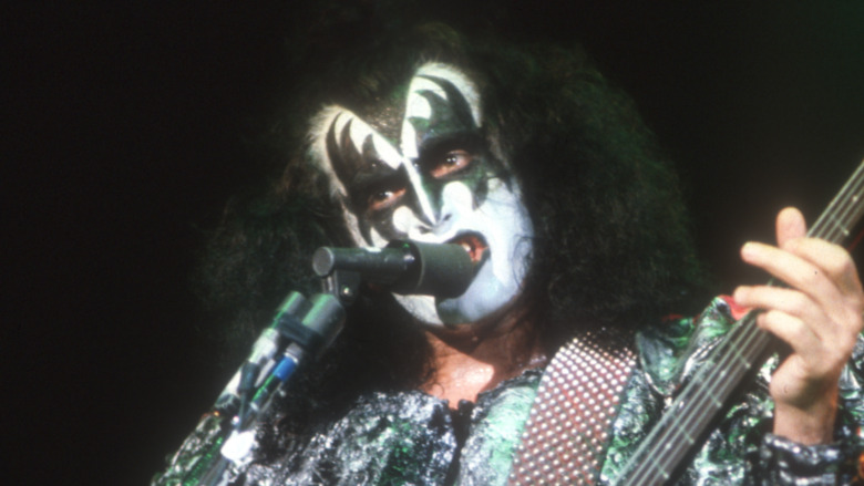 Gene Simmons singing at mic