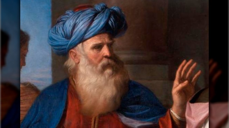 abraham with blue headwear