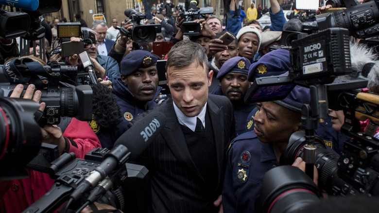 Oscar Pistorius talking to reporters