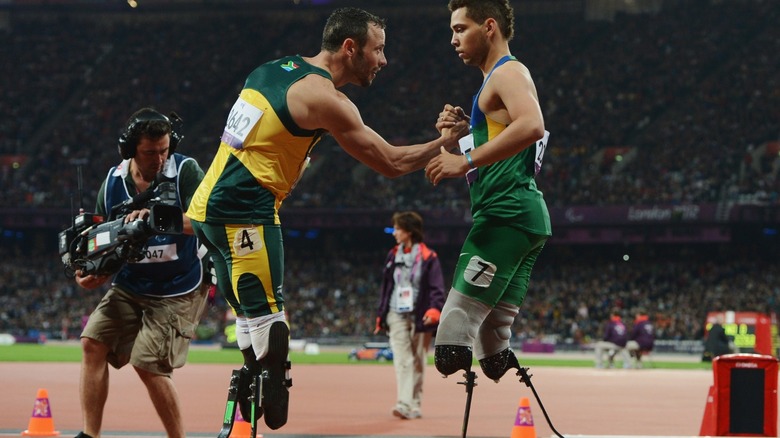 Oscar Pistorius shaking runner's hand