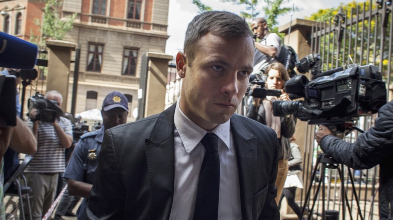 Oscar Pistorius frowning outside court