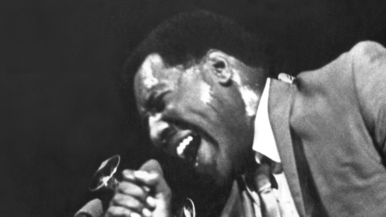 Otis Redding singing at mic