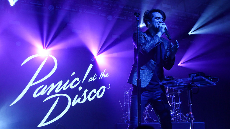 Brendon Urie on stage blue lights