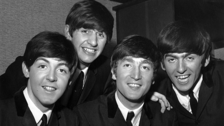 The Beatles smiling