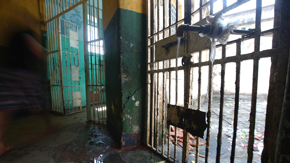 Open door in prison cell