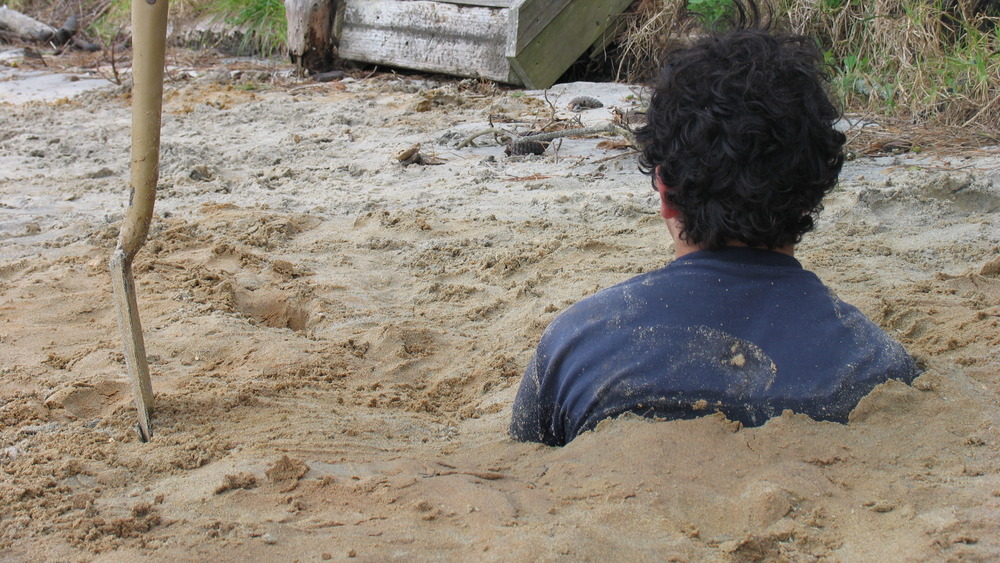 Man buried alive in sand