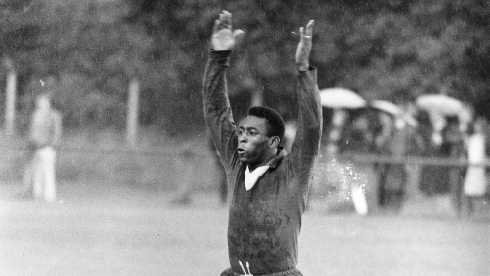 Pele playing soccer