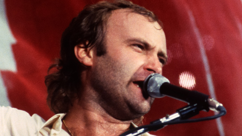 Phil Collins plays Live Aid