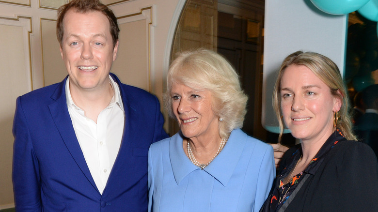 Tom and Camilla Parker Bowles and Laura Lopes smiling