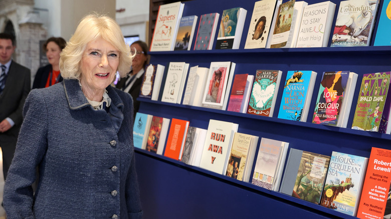 Camilla Parker Bowles in front of books