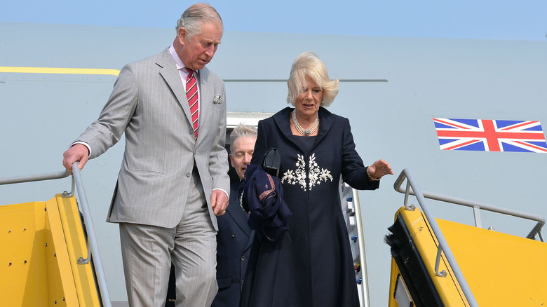 Camilla Parker Bowles emerging from a plane in 2017