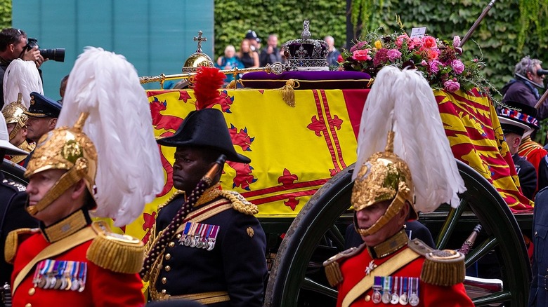 Crown jewels on paraded coffin