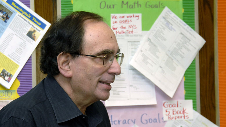 R.L. Stine smiling in a school