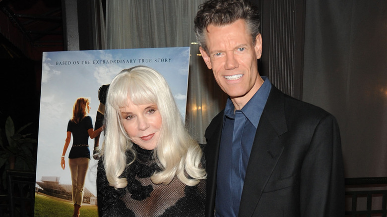 Lib Hatcher-Travis and Randy Travis at a movie premiere