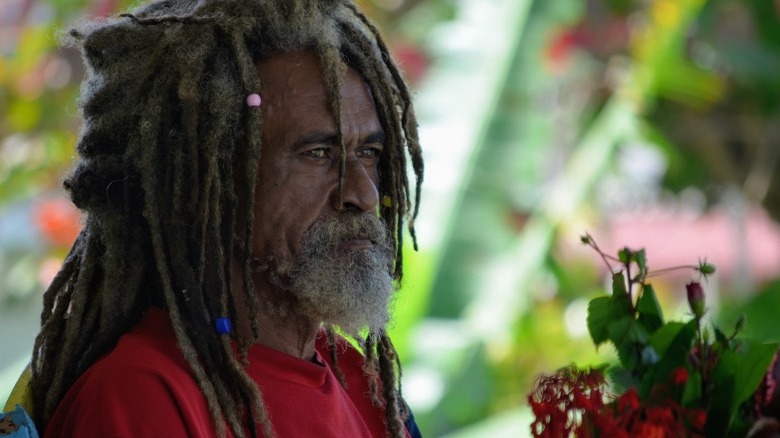 Old Rasta listening to music