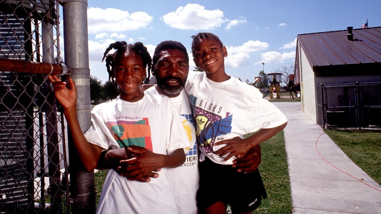 Richard, Venus, and Serena Williams at tennis court