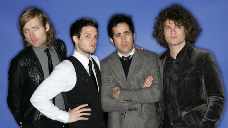 The Killers posing for a portrait